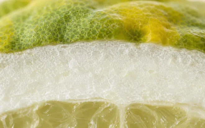 Macro detail of sliced bergamot fruit