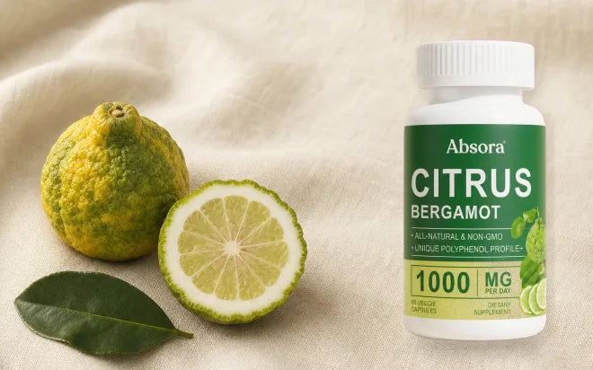 Absora Citrus Bergamot bottle with whole and sliced bergamot fruit